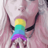 GatitaChan Gives Her Rainbow Toy a Blowjob