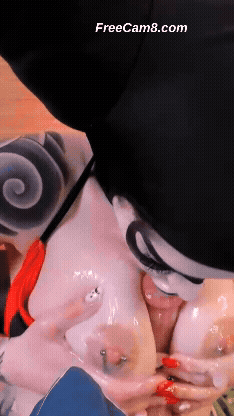 Sucking Dildo While Rubbing Between Her Boobs